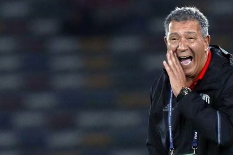 Al Jazira's head coach Henk Ten Cate gives directions to his players during the Club World Cup soccer match between Al Jazira Club and Urawa Reds at Zayed sport city in Abu Dhabi, United Arab Emirates, Saturday, Dec. 9, 2017. (AP Photo/Hassan Ammar)