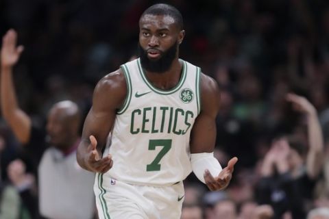 Boston Celtics guard Jaylen Brown (7) celebrates after hitting a 3-pointer during the second half of an NBA basketball game against the Miami Heat in Boston, Wednesday, Dec. 4, 2019. (AP Photo/Charles Krupa)
