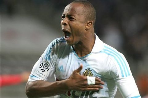 Marseille's Ghanaian forward Andre Ayew reacts after scoring his 2nd goal against Ajaccio during their League One soccer match, at the Velodrome Stadium, in Marseille, southern France, Saturday, Oct. 22, 2011. (AP Photo/Claude Paris)