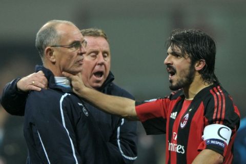 AC Milan's midfielder Gennaro Ivan Gattuso (R) argues with a member of Tottenham's  staff (L) and Tottenham's coach Harry Redknapp (C) during their Champions League football match on February 15, 2011 at San Siro Stadium in Milan.  AFP PHOTO / OLIVIER MORIN (Photo credit should read OLIVIER MORIN/AFP/Getty Images)