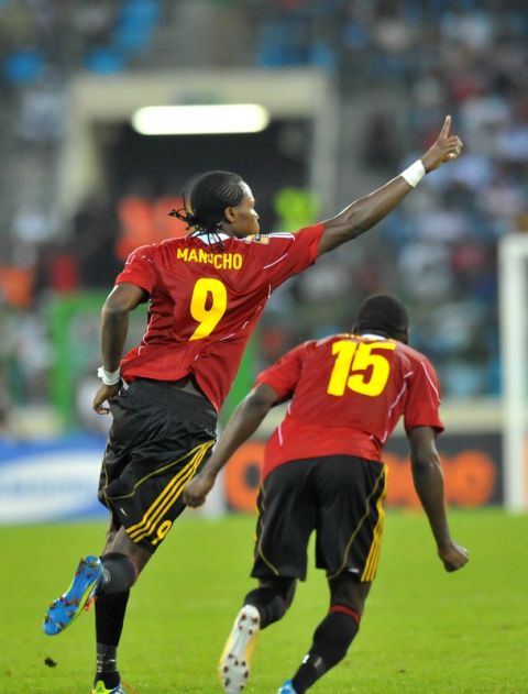 Angola's Mateus Contreiras Alberto know as "Manucho" (L) celebrates next to his teammate Miguel Geraldo Quiami (R) after scoring against Burkina Faso during their Africa Cup of Nations (CAN), group B, football match at the Malabo stadium in Malabo on January 22, 2012.  AFP PHOTO / ALEXANDER JOE (Photo credit should read ALEXANDER JOE/AFP/Getty Images)