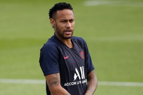PSG's Neymar attends a training session at Camp des Loges in Saint Germain en Laye, outside Paris, France, Saturday, Aug. 10, 2019. (AP Photo/Francois Mori)