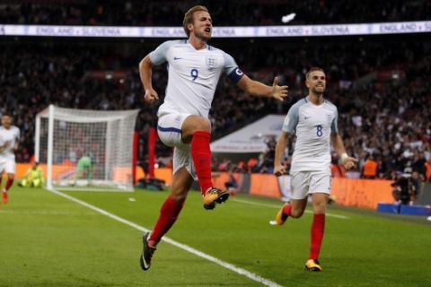 England's Harry Kane celebrates after scoring the opening goal of his team during the World Cup Group F qualifying soccer match between England and Slovenia at Wembley stadium in London, Thursday, Oct. 5, 2017. England won 1-0. (AP Photo/Frank Augstein)