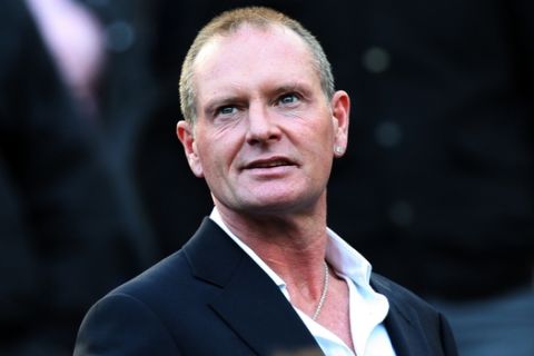 FILE - In this Oct. 16, 2011 file photo, Paul Gascoigne, is seen at the English Premier League soccer match between Newcastle United and Tottenham Hotspurs at St James' Park, Newcastle, England. According to news reports published Sunday March 10, 2013, Gascoigne says he's back from brink of death after receiving treatment for alcoholism in USA. The 45-year-old Gascoigne flew back home on Saturday, a month after being admitted to the intensive care unit of a hospital in Phoenix, USA, following a relapse in his long-running struggle with alcoholism. (AP Photo/Scott Heppell, File)
