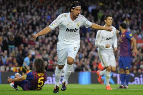 BARCELONA, SPAIN - APRIL 21:  Sami Khedira of Real Madrid CF celebrates after scoring the opening goal during the La Liga match between FC Barcelona and Real Madrid at Camp Nou on April 21, 2012 in Barcelona, Spain.  (Photo by David Ramos/Getty Images)