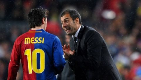 BARCELONA, SPAIN - DECEMBER 13:  Coach Pep Guardiola (R) of Barcelona instructs Lionel Messi during the La Liga match between Barcelona and Real Madrid at the Camp Nou Stadium on December 13, 2008 in Barcelona, Spain. Barcelona won the match 2-0.  (Photo by Jasper Juinen/Getty Images)