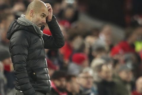 Manchester City's head coach Pep Guardiola gestures during the English Premier League soccer match between Liverpool and Manchester City at Anfield stadium in Liverpool, England, Sunday, Nov. 10, 2019. (AP Photo/Jon Super)