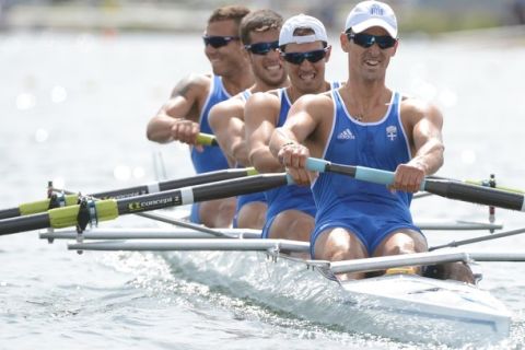 (R)-L Greece's Stergios Papachristos, Ioannis Tsilis, Georgios Tziallas and Ioannis Christou compete in the men's four heats of the rowing event during the London 2012 Olympic Games, at Eton Dorney Rowing Centre in Eton, west of London, on July 30, 2012. AFP PHOTO / DAMIEN MEYER        (Photo credit should read DAMIEN MEYER/AFP/GettyImages)