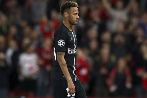 Paris Saint-Germain's Neymar appears dejected after the UEFA Champions League, Group C match at Anfield, Liverpool, Tuesday Sept. 18, 2018. (Peter Byrne/PA via AP)