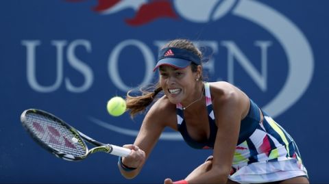 Ana Ivanovic, of Serbia, returns a shot to Denisa Allertova, of the Czech Republic, during the first round of the U.S. Open tennis tournament, Tuesday, Aug. 30, 2016, in New York. (AP Photo/Alex Brandon)