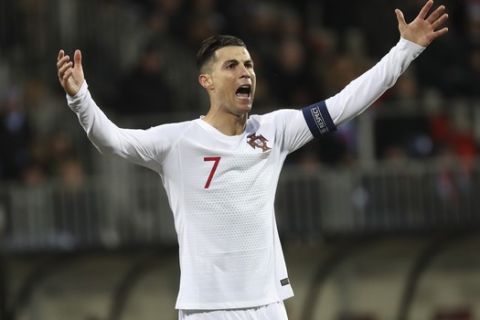 Portugal's Cristiano Ronaldo reacts during the Euro 2020 group B qualifying soccer match between Luxembourg and Portugal at the Josy Barthel stadium in Luxembourg, Sunday, Nov. 17, 2019. (AP Photo/Francisco Seco)