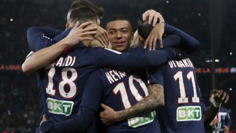 PSG's Neymar celebrates with, Mauro Icardi Kylian Mbappe and Angel Di Maria after scoring his side's second goal during the French League Cup quarter final soccer match between Paris Saint Germain and Saint Etienne at the Parc des Princes stadium in Paris, Wednesday, Jan. 8, 2020. (AP Photo/Thibault Camus)