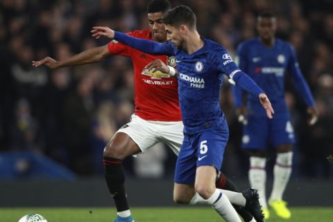 Chelsea's Jorginho vies for the ball with Manchester United's Marcus Rashford, left, during the English League Cup soccer match between Chelsea and Manchester United at Stamford Bridge in London, Wednesday, Oct. 30, 2019. (AP Photo/Ian Walton)