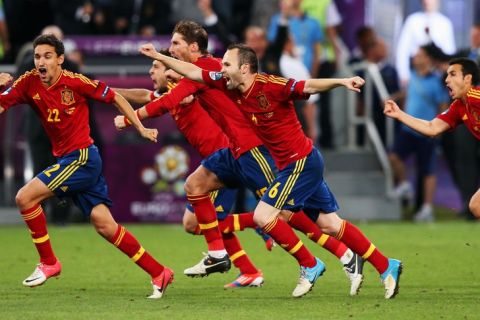 DONETSK, UKRAINE - JUNE 27:  Jesus Navas, Sergio Ramos and Andres Iniesta of Spain celebrate the winning penalty during the UEFA EURO 2012 semi final match between Portugal and Spain at Donbass Arena on June 27, 2012 in Donetsk, Ukraine.  (Photo by Alex Livesey/Getty Images)