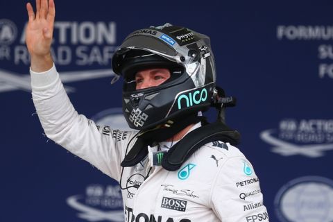 MEXICO CITY, MEXICO - OCTOBER 31:  Nico Rosberg of Germany and Mercedes AMG F1 celebrates pole position after qualifying for the Formula One Grand Prix of Mexico at Autodromo Hermanos Rodriguez on October 31, 2015 in Mexico City, Mexico.  (Photo by Clive Mason/Getty Images)