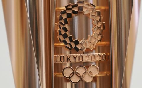 The emblem of the Olympic torch of the Tokyo 2020 Olympic Games is seen during a press conference in Tokyo Wednesday, March 20, 2019. (AP Photo/Eugene Hoshiko)