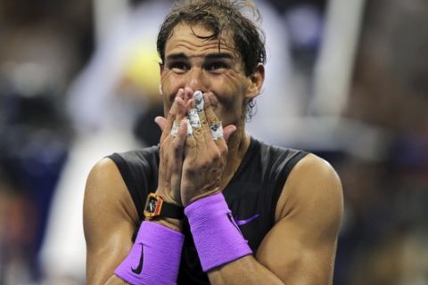 Rafael Nadal, of Spain, reacts after defeating Daniil Medvedev, of Russia, to win the men's singles final of the U.S. Open tennis championships Sunday, Sept. 8, 2019, in New York. (AP Photo/Charles Krupa)