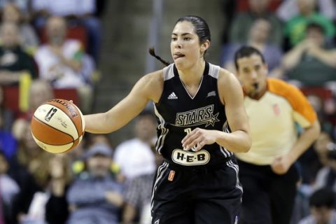 San Antonio Stars' Kelsey Plum in action against the Seattle Storm in a WNBA basketball game Sunday, June 18, 2017, in Seattle. (AP Photo/Elaine Thompson)