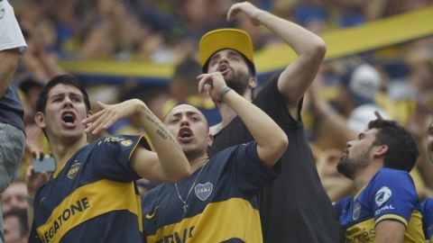 Fans of Argentina's Boca Juniors cheer prior to a Copa Libertadores first leg final match against Argentina's River Plate in Buenos Aires, Argentina, Saturday, Nov. 10, 2018. (AP Photo/Gustavo Garello)