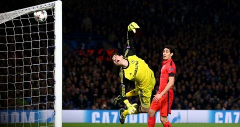 LONDON, ENGLAND - MARCH 11:  Goalkeeper Thibaut Courtois of Chelsea dives in vain as the shot from Thiago Silva (not seen) of PSG flies into his net to level the scores at 2-2 during the UEFA Champions League Round of 16, second leg match between Chelsea and Paris Saint-Germain at Stamford Bridge on March 11, 2015 in London, England.  (Photo by Paul Gilham/Getty Images)
