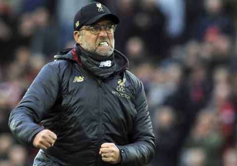 Liverpool manager Juergen Klopp celebrates at the end of the English Premier League soccer match between Liverpool and Tottenham Hotspur at Anfield stadium in Liverpool, England, Sunday, March 31, 2019. (AP Photo/Rui Vieira)
