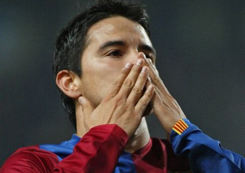 Barcelona's Javier Saviola gestures as he celebrates after scoring a goal against Espanyol during their Spanish League football match at the Olympic Stadium  in Barcelona, 13 January 2007. AFP PHOTO/CESAR RANGEL