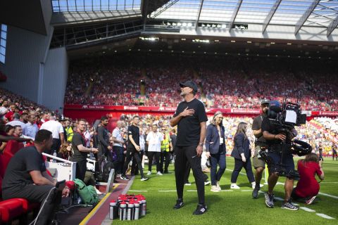 Liverpool's manager Jurgen Klopp greets supporters ahead the English Premier League soccer match between Liverpool and Wolverhampton at Anfield Stadium, in Liverpool, England, Sunday, May 19, 2024. (AP Photo/Jon Super)