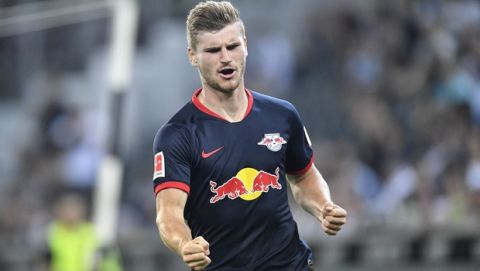 Leipzig's Timo Werner celebrates after he scored his second goal during the German Bundesliga soccer match between Borussia Moenchengladbach and RB Leipzig in Moenchengladbach, Germany, Friday, Aug. 30, 2019. (AP Photo/Martin Meissner)