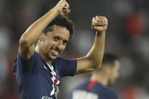PSG's Marquinhos celebrates after scoring his sides fourth goal during the French League One soccer match between Paris Saint Germain and Toulouse at the Parc des Princes Stadium in Paris, France, on Sunday, Aug. 25, 2019. (AP Photo/David Vincent)