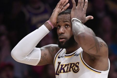 Los Angeles Lakers forward LeBron James reacts after being charged with a foul during the second half of an NBA basketball game against the Orlando Magic Sunday, Nov. 25, 2018, in Los Angeles. The Magic won 108-104. (AP Photo/Mark J. Terrill)