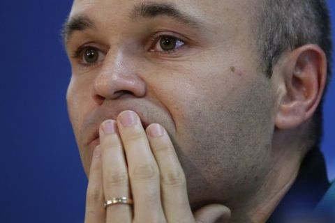 FC Barcelona's Andres Iniesta gestures during a press conference at the Sports Center FC Barcelona Joan Gamper in Sant Joan Despi, Spain, Tuesday, April 18, 2017. FC Barcelona will play against Juventus in a Champions League quarterfinal, second-leg soccer match on Wednesday. (AP Photo/Manu Fernandez)