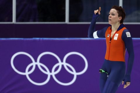 Jorien ter Mors of The Netherlands celebrates setting a new Olympic record in the women's 1,000 meters speedskating race at the Gangneung Oval at the 2018 Winter Olympics in Gangneung, South Korea, Wednesday, Feb. 14, 2018. (AP Photo/John Locher)