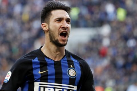 Inter Milan's Matteo Politano celebrates after scoring his side's opening goal during the Serie A soccer match between Inter Milan and Spal at the San Siro Stadium, in Milan, Italy, Sunday, March 10, 2019. (AP Photo/Antonio Calanni)