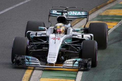 Mercedes driver Lewis Hamilton of Britain steers his car during qualifying for the Australian Formula One Grand Prix in Melbourne, Australia, Saturday, March 25, 2017. (AP Photo/Rick Rycroft)