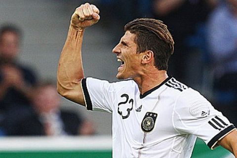 SINSHEIM, GERMANY - MAY 29: Mario Gomez of Germany celebrates his team's first goal during the international friendly charity match between Germany and Uruguay at Rhein-Neckar Arena on May 29, 2011 in Sinsheim, Germany.  (Photo by Alex Grimm/Bongarts/Getty Images)