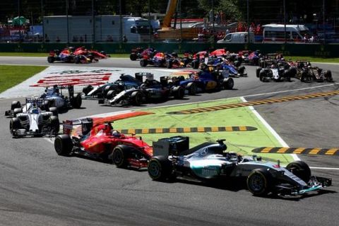 MONZA, ITALY - SEPTEMBER 06:  Lewis Hamilton of Great Britain and Mercedes GP leads the field at the start of the Formula One Grand Prix of Italy at Autodromo di Monza on September 6, 2015 in Monza, Italy.  (Photo by Mark Thompson/Getty Images)