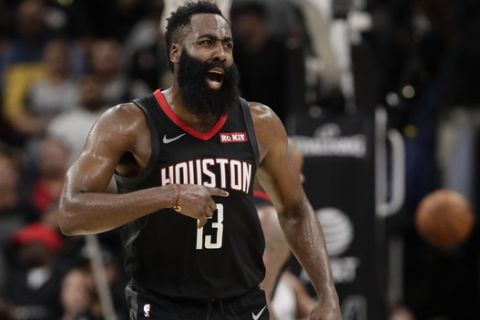 Houston Rockets guard James Harden (13) reacts to a play during overtime of an NBA basketball game against the San Antonio Spurs, in San Antonio, Tuesday, Dec. 3, 2019. San Antonio won 135-133 in double overtime. (AP Photo/Eric Gay)