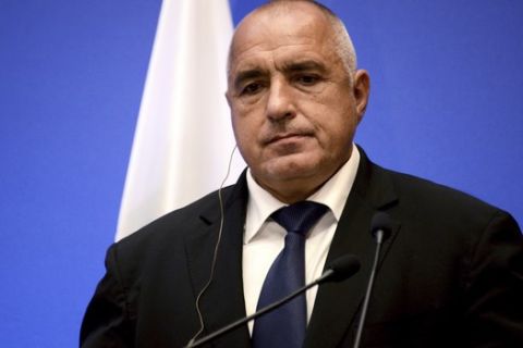 Bulgarian Prime Minister Boyko Borisov listens to his Greek counterpart Alexis Tsipras during a news conference, after a meeting of the heads of government of Greece, Bulgaria, Romania and Serbia, at the northern port city of Thessaloniki , Greece, on Wednesday, July 4, 2018.Talks focused on boosting local road and rail transport networks, which Tsipras said, together with harbor projects in the Aegean and the Black Sea, would help sea-borne trade bypass the congested Bosporus Straits in Turkey. (AP Photo/Giannis Papanikos)
