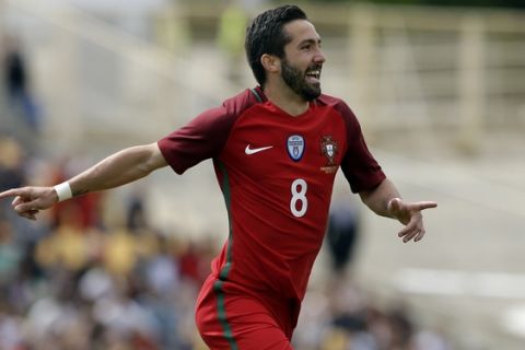 Portugal's Joao Moutinho celebrates after scoring the opening goal during the international friendly soccer match between Portugal and Cyprus in Estoril, outside Lisbon, Saturday, June 3 2017. (AP Photo/Armando Franca)