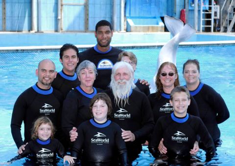 SAN ANTONIO - AUGUST 9:  San Antonio Spurs Tim Duncan (C) was joined by Spurs season ticket holders the Gloria and Wil Drash (C) family for a Swim with Tim and Beluga whales event auctioned off during the Spurs annual Tux-N-Tennies Dinner at SeaWorld San Antonio on August 9, 2010, in San Antonio, Texas. NOTE TO USER: User expressly acknowledges and agrees that, by downloading and/or using this photograph, User is consenting to the terms and conditions of the Getty Images License Agreement. Mandatory Copyright Notice: Copyright 2010 NBAE (Photo by D. Clarke Evans/NBAE via Getty Images) *** Local Caption *** Tim Duncan;Gloria Drash;Wil Drash
