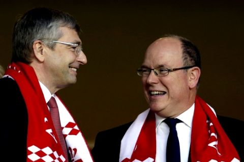 Prince Albert II of Monaco, right, speaks with President of AS Monaco Football Club, Dmitri Rybolovlev of Russia during the League One soccer match Monaco against Saint Etienne, at the Louis II stadium in Monaco, Wednesday, May 17, 2017. (AP Photo/Claude Paris)