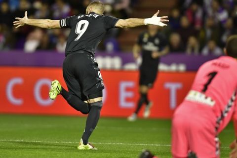Real Madrid's Karim Benzema, celebrates his second goal against Real Valladolid during the Spanish La Liga soccer match between Real Madrid and Valladoid FC at Jose Zorrila New stadium in Valladolid, northern Spain, Sunday, March 10, 2019. (AP Photo/Alvaro Barrientos)