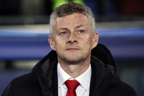 Manchester United coach Ole Gunnar Solskjaer looks out from the bench prior the Champions League quarterfinal, second leg, soccer match between FC Barcelona and Manchester United at the Camp Nou stadium in Barcelona, Spain, Tuesday, April 16, 2019. (AP Photo/Manu Fernandez)