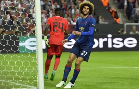 United's Marouane Fellaini reacts after a missed chance to score during the soccer Europa League final between Ajax Amsterdam and Manchester United at the Friends Arena in Stockholm, Sweden, Wednesday, May 24, 2017. (AP Photo/Martin Meissner)