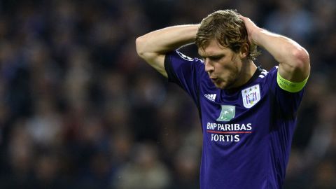 Anderlecht's Belgian midfielder Guillaume Gillet reacts during the UEFA Champions League group C football match between Anderlecht and Paris Saint-Germain in Brussels on October 23, 2013. AFP PHOTO / FRANCK FIFE        (Photo credit should read FRANCK FIFE/AFP/Getty Images)