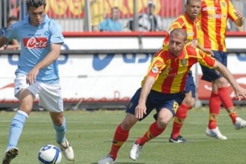 Napoli's Jesus Alberto Datolo, left, and Lecce's Dimitris Papadopoulos, in action during the Italian Serie A soccer match between Lecce and Napoli in Lecce, southern Italy, Sunday, May 10, 2009. (AP Photo/Ivan Tortorella)