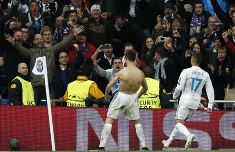 Real Madrid's Cristiano Ronaldo celebrates after scooring during a Champions League quarter final second leg soccer match between Real Madrid and Juventus at the Santiago Bernabeu stadium in Madrid, Wednesday, April 11, 2018. (AP Photo/Francisco Seco)