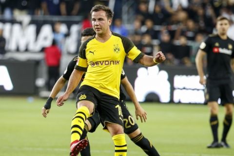 Borussia Dortmund midfielder Mario Götze (10) of Germany, in actions during an international friendly soccer game between Los Angeles FC and Borussia Dortmund in Los Angeles, Tuesday, May 22, 2018. The game ended in a 1-1 draw. (AP Photo/Ringo H.W. Chiu)
