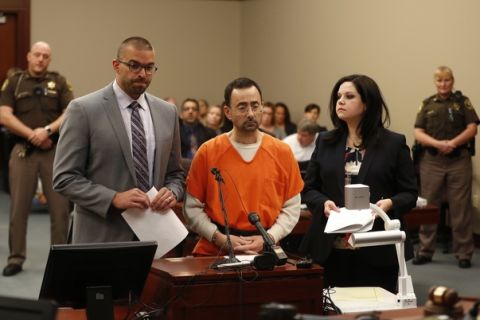 Dr. Larry Nassar, 54, appears in court for a plea hearing in Lansing, Mich., Wednesday, Nov. 22, 2017. Nasser, a sports doctor accused of molesting girls while working for USA Gymnastics and Michigan State University, pleaded guilty to multiple charges of sexual assault and will face at least 25 years in prison. (AP Photo/Paul Sancya)
