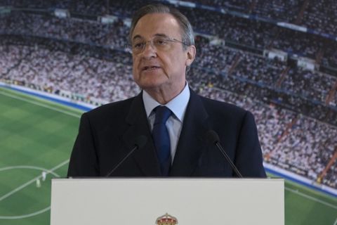 In this photo taken Monday, Nov. 7, 2016, Real Madrid's President Florentino Perez speaks at the Santiago Bernabeu stadium in Madrid, Spain. Florentino Perez is making sure Real Madrid remains a top contender by sticking to the current group of players who helped the team thrive in recent years by extending the contract of Madrid's top players past 2020. (AP Photo/Paul White)